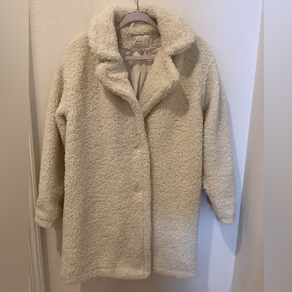 A new day white Sherpa